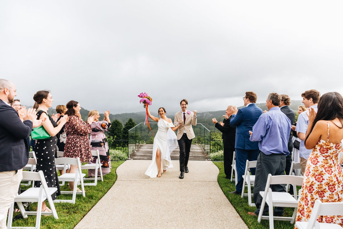 Alanah + Aimon walking back down the Aisle at their wedding at the old dairy maleny